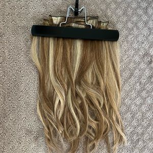 Human hair extensions.  Dirty Blonde.  Clip in.